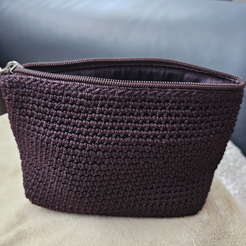 The SAK Hand-Crochet Recycled Polypropylene Yarn Essential Pouch.